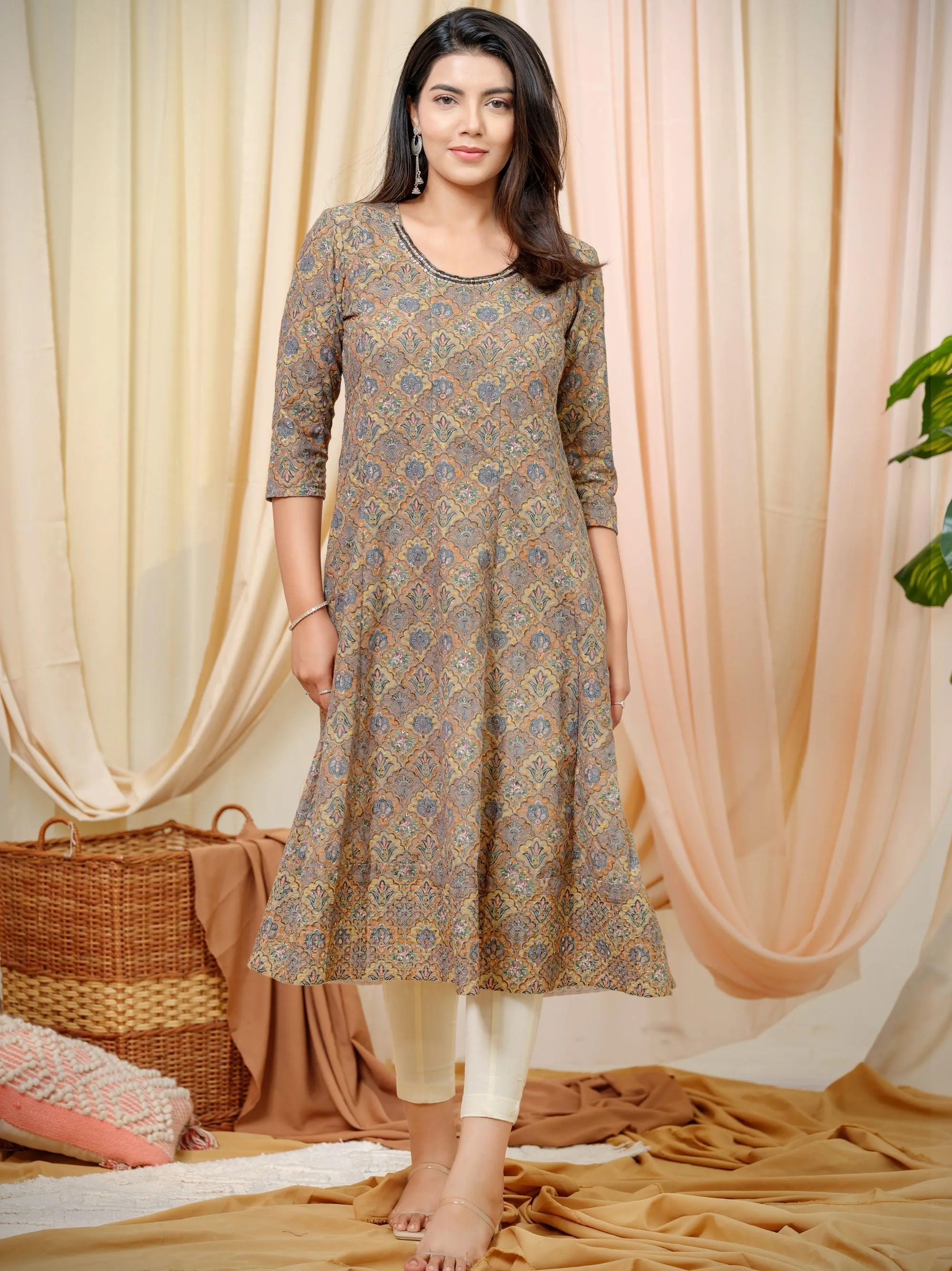 Kali kurta with a round neck and sequin detailing at neck